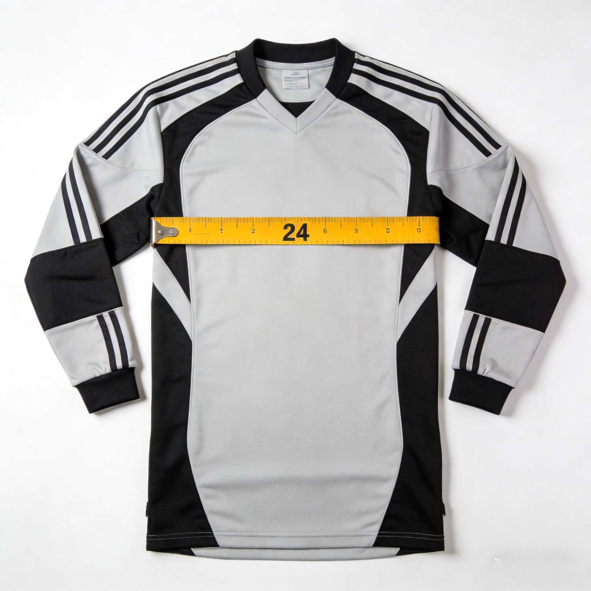 Measuring a goalkeeper jersey in inches for a perfect fit.