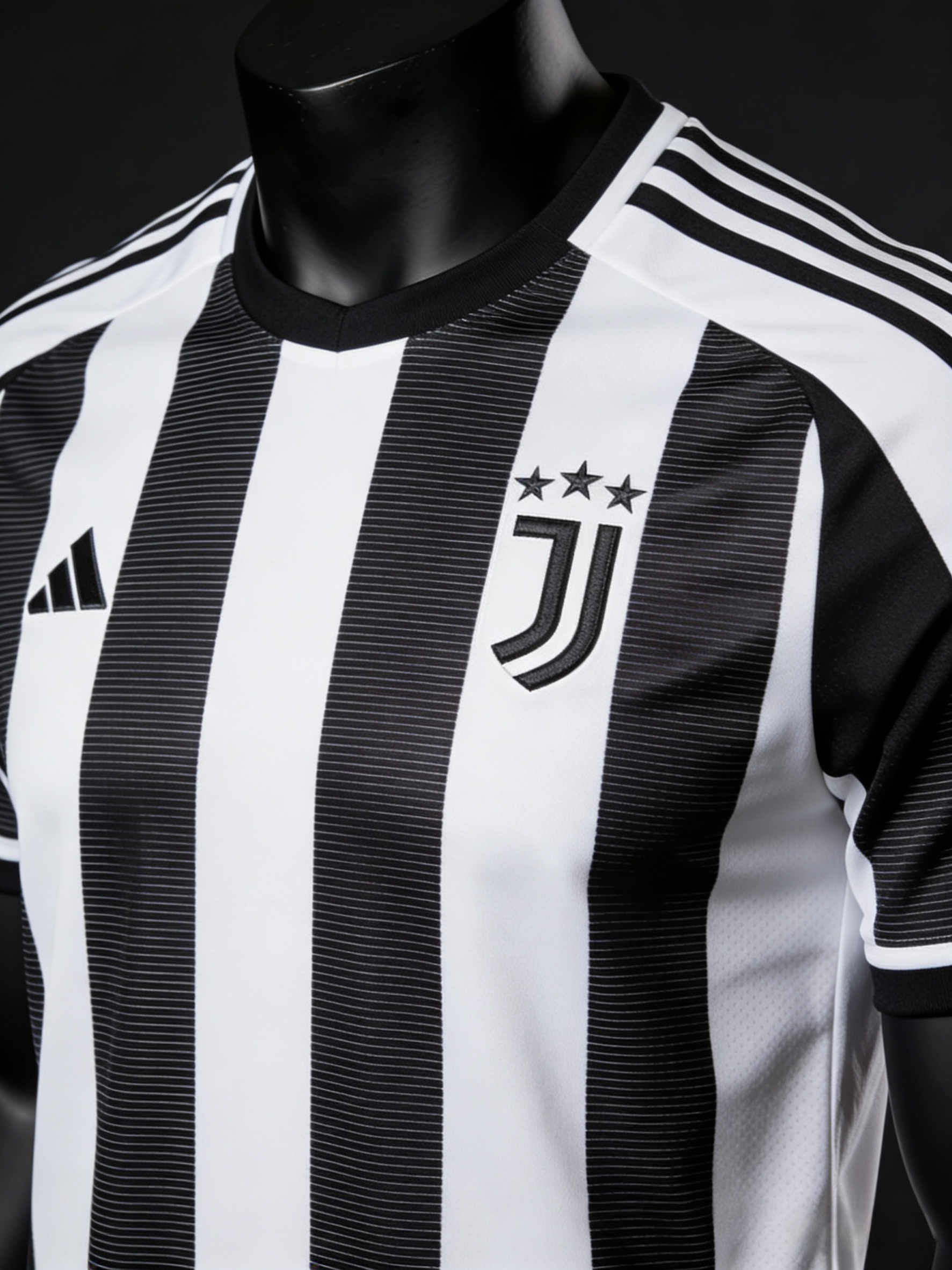 Official 2025 Juventus home soccer jersey with black and white stripes