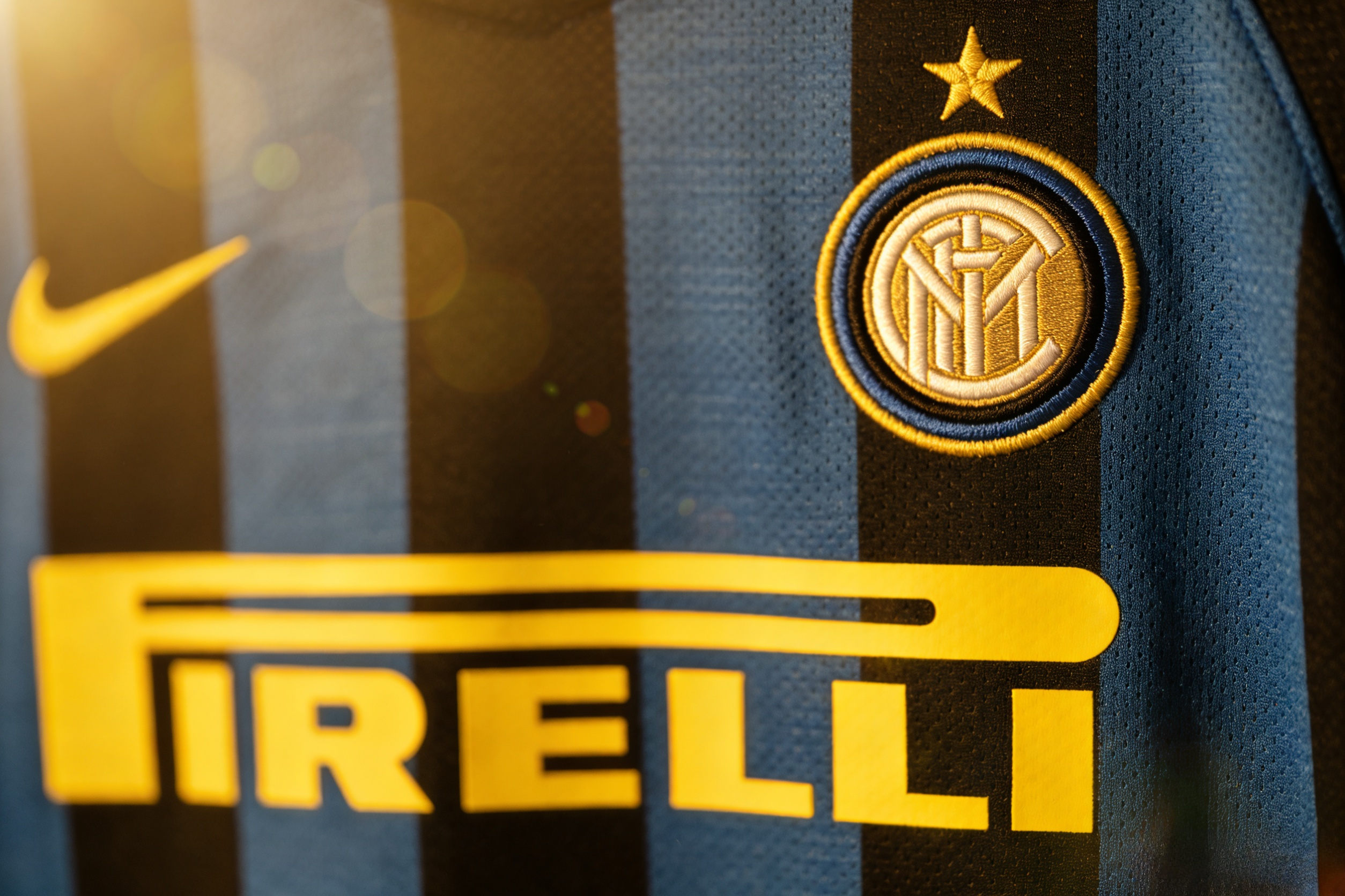 Close-up detail of a retro Inter Milan shirt with Pirelli logo.